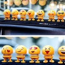 Automobile head shaking emoji decoration with LED sunglass